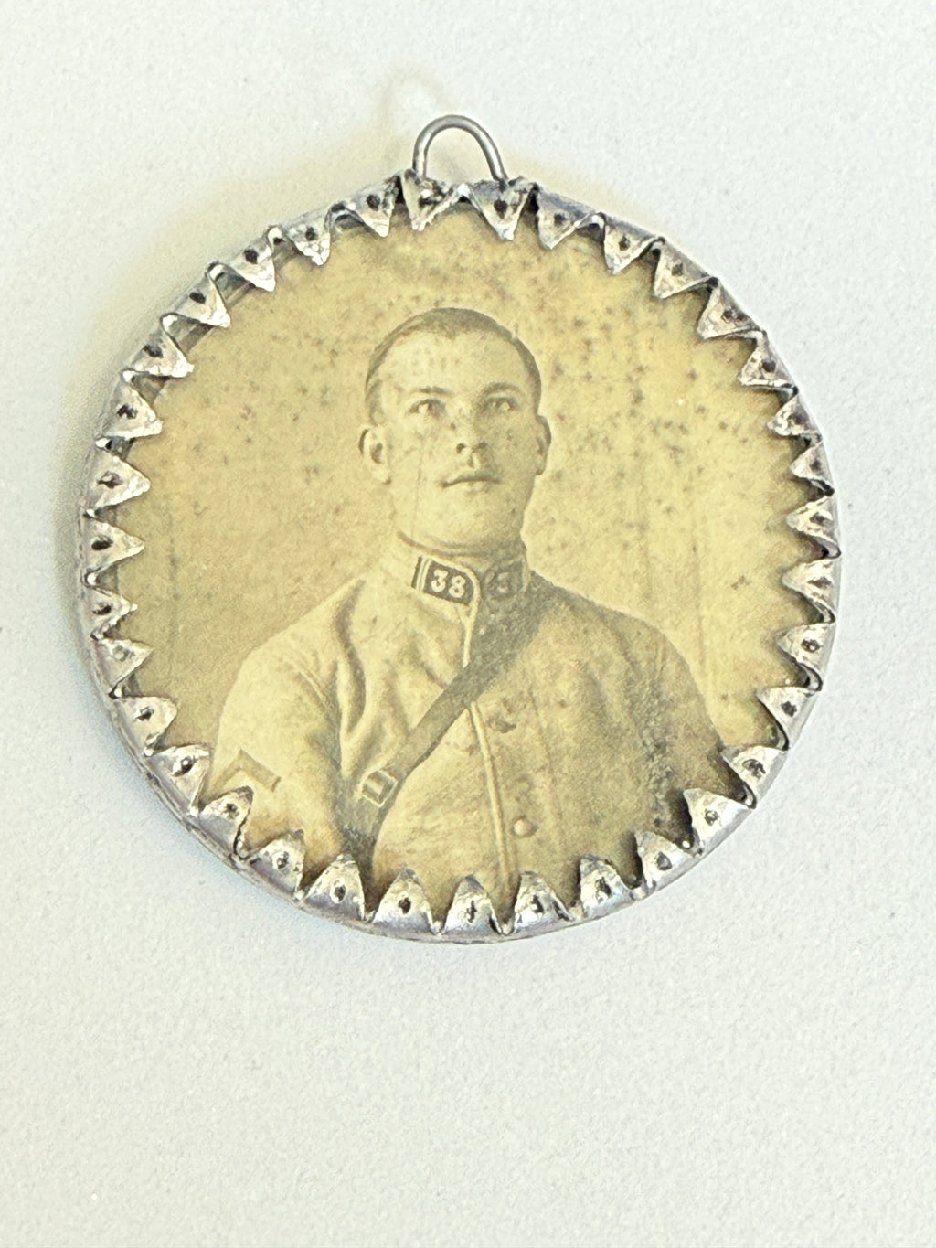 WWI French Soldier Portrait Aluminum Trench Art Pendant – "Souvenir de l'Armée d'Orient"