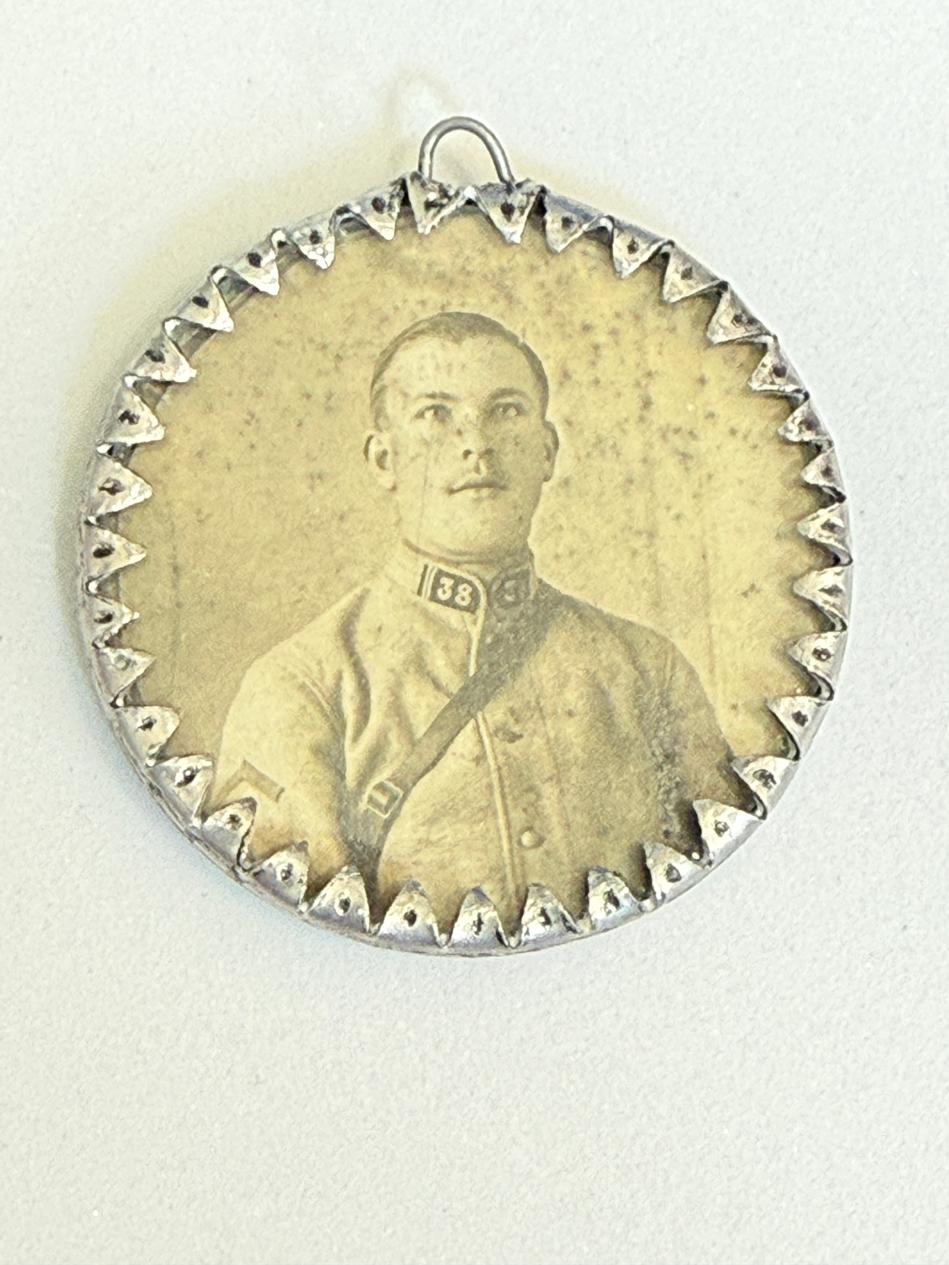 WWI French Soldier Portrait Aluminum Trench Art Pendant – "Souvenir de l'Armée d'Orient"