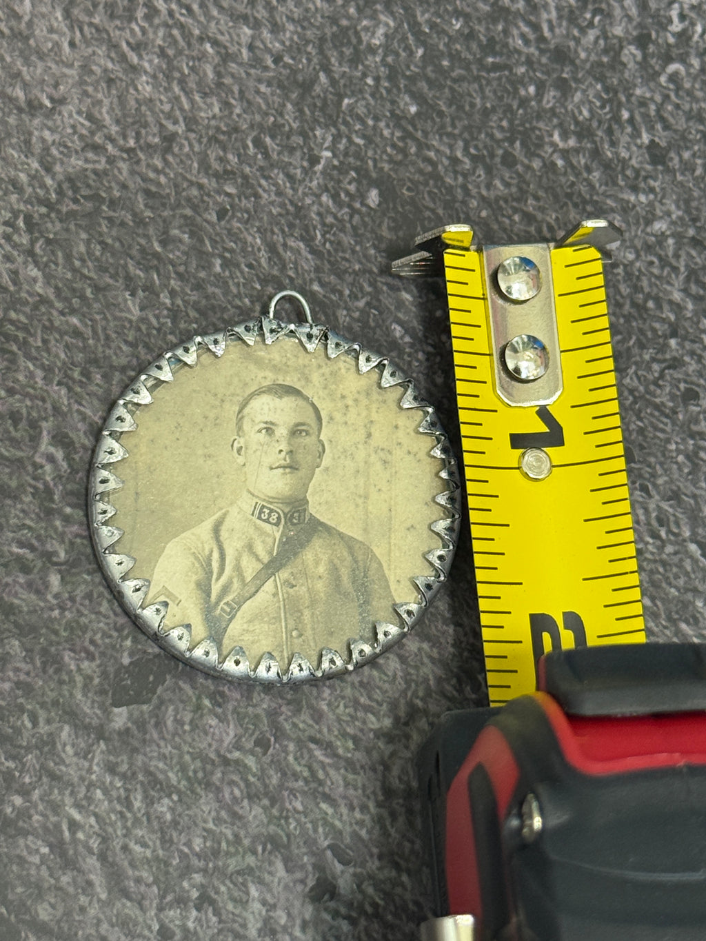 WWI French Soldier Portrait Aluminum Trench Art Pendant – "Souvenir de l'Armée d'Orient"