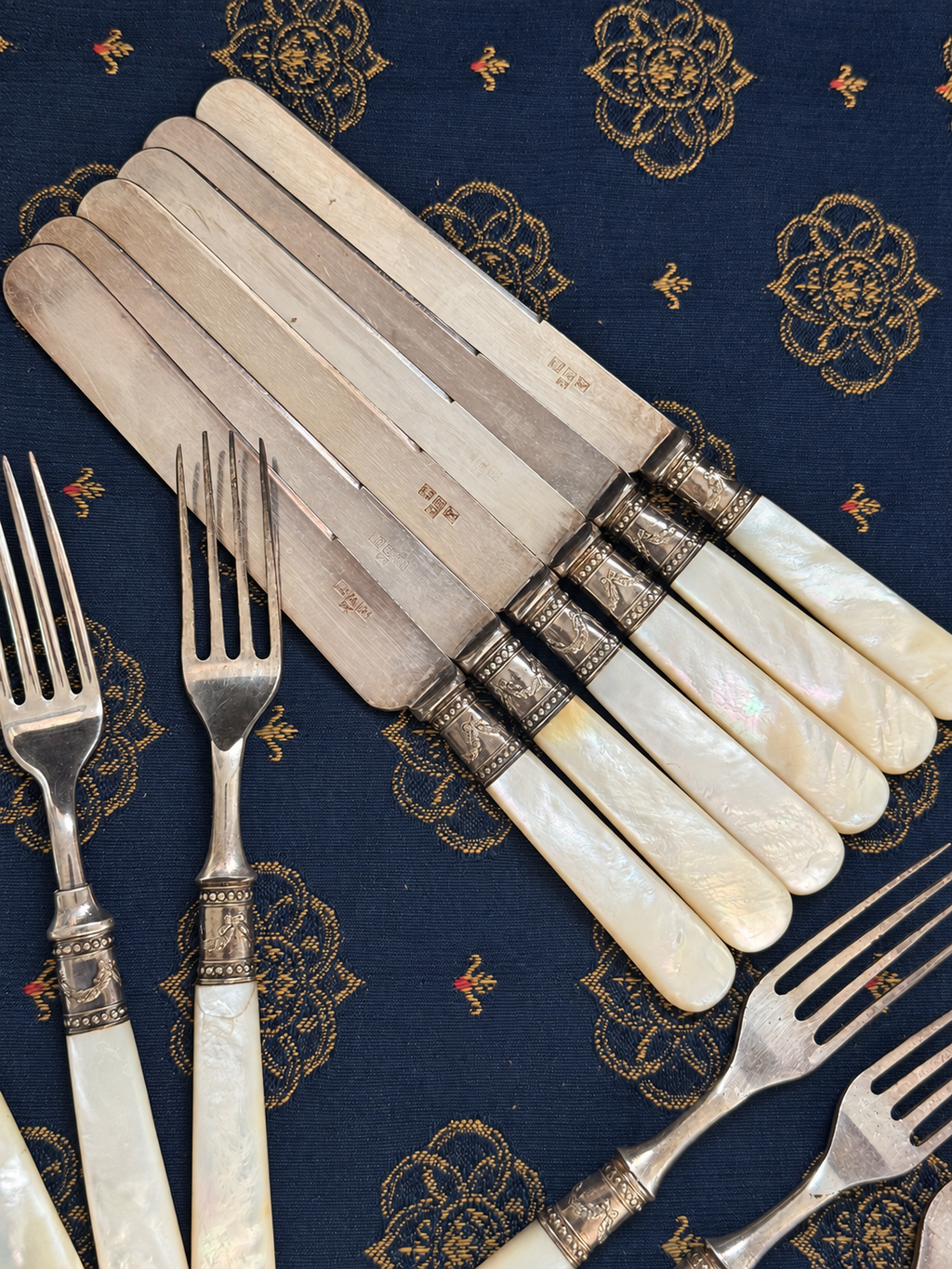Mother-of-Pearl Flatware with Sterling-Marked Fittings