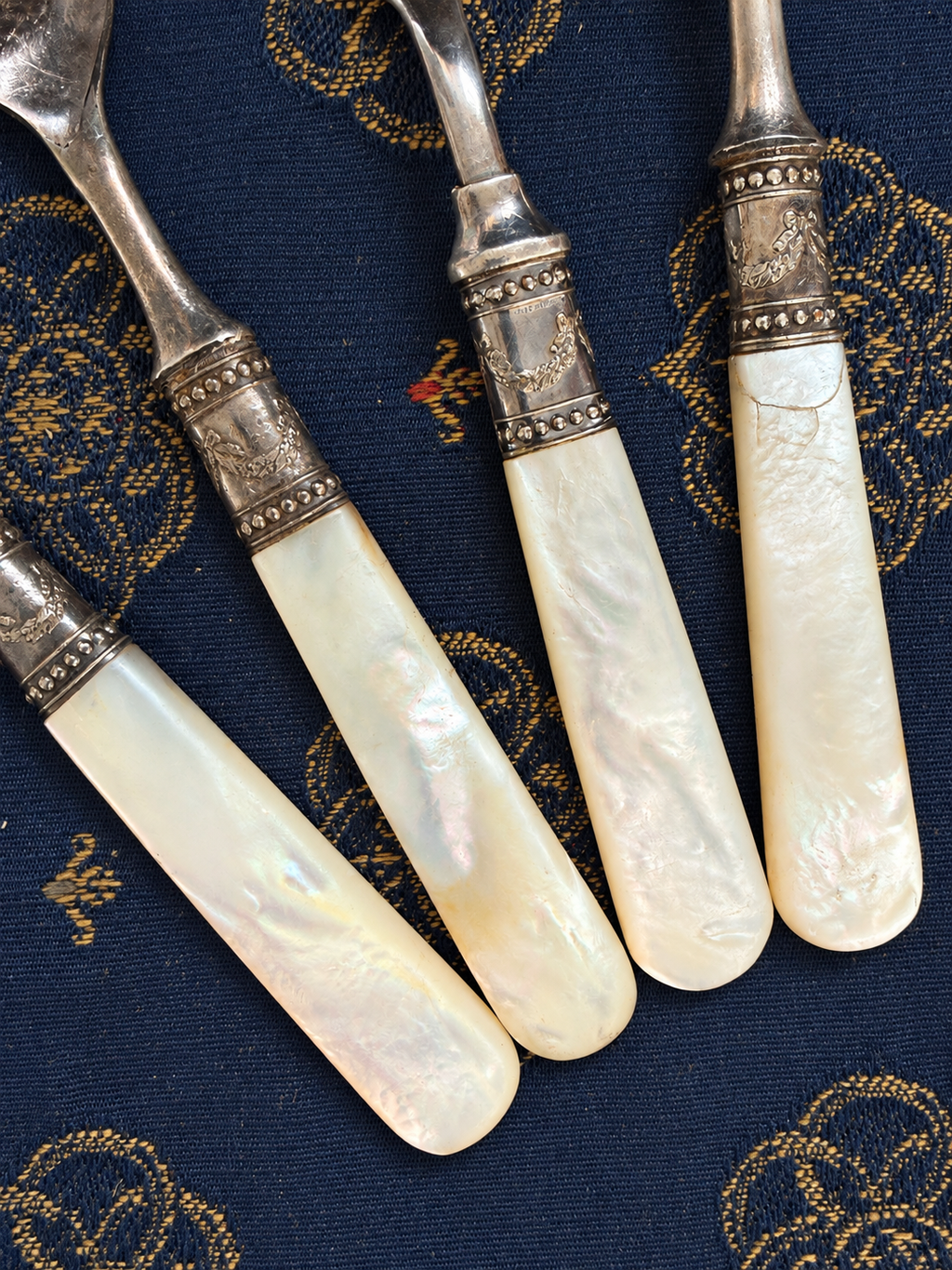 Mother-of-Pearl Flatware with Sterling-Marked Fittings