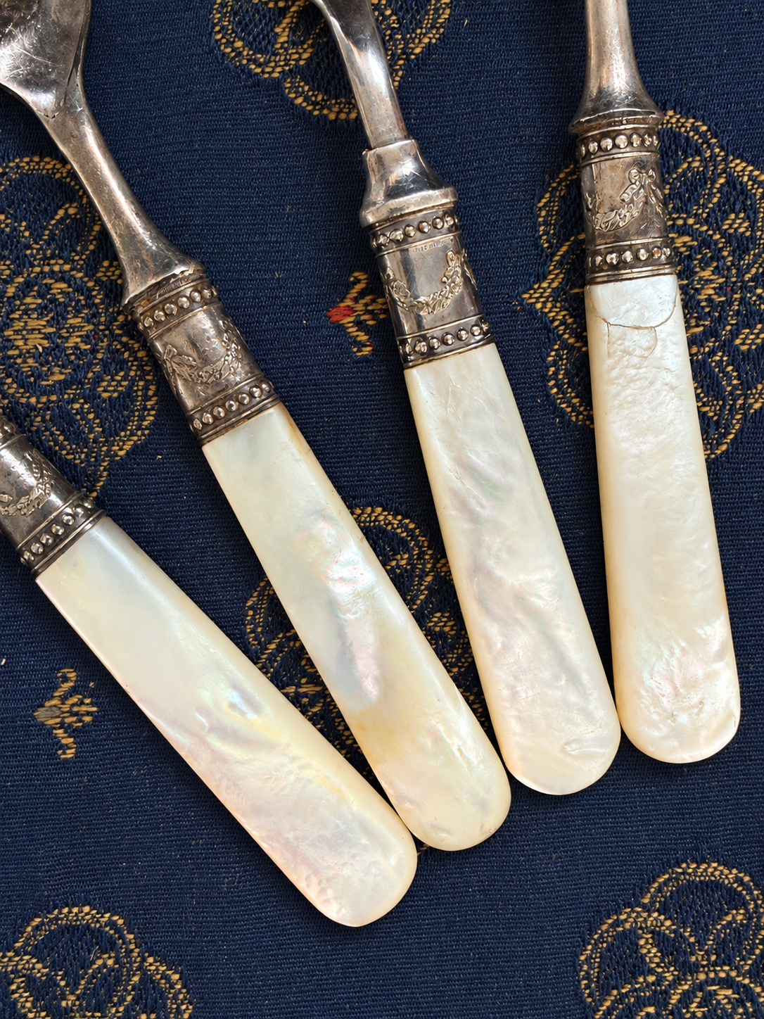 Mother-of-Pearl Flatware with Sterling-Marked Fittings
