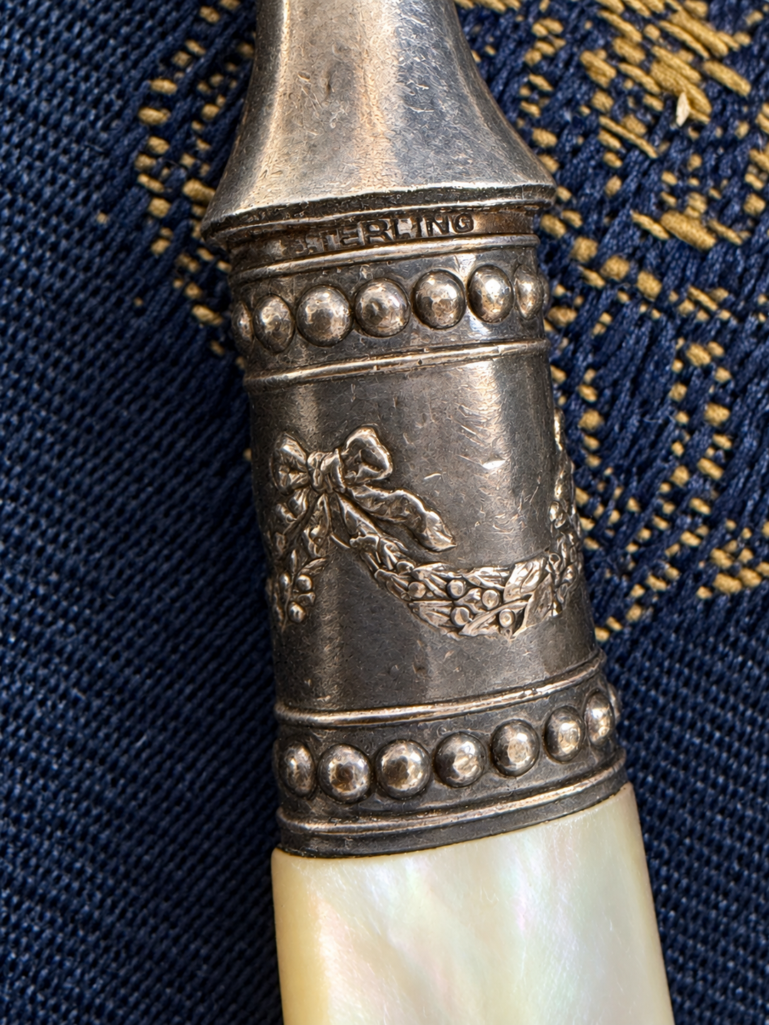 Mother-of-Pearl Flatware with Sterling-Marked Fittings